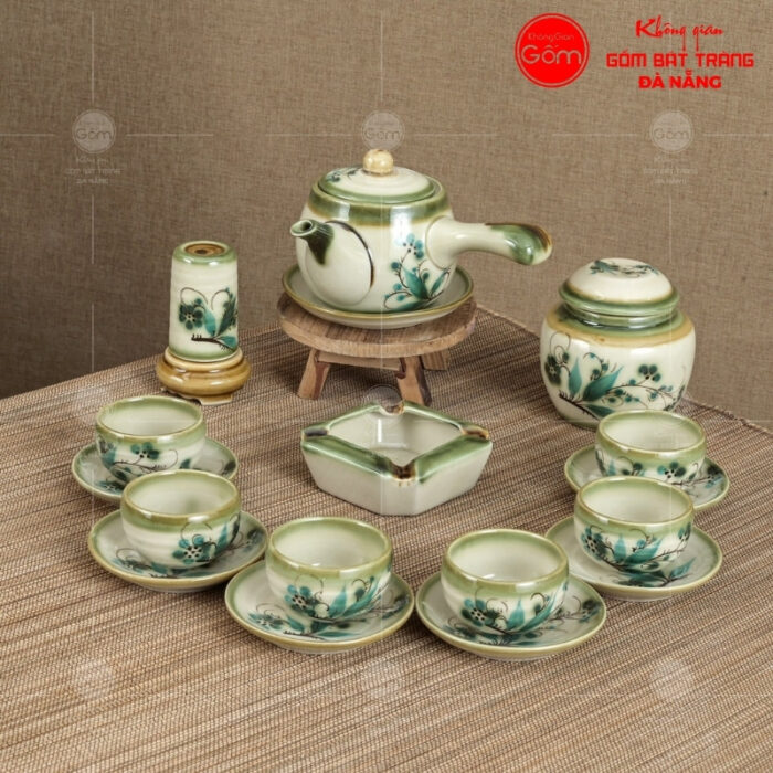 bo-am-chen-mau-nga-quai-chuoi-hoa-tiet-truc-xanh-ve-tay