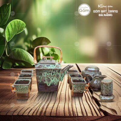 bo-am-chen-dang-hinh-thang-quai-may-xach-men-xanh-hoa-bien