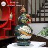 ho-lo-gom-su-bat-trang-thuan-buom-xuoi-gio-va-luu-do-xanh-la