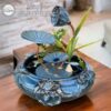thac-nuoc-phong-thuy-dang-hoa-sen-men-hoa-bien-xanh (1)