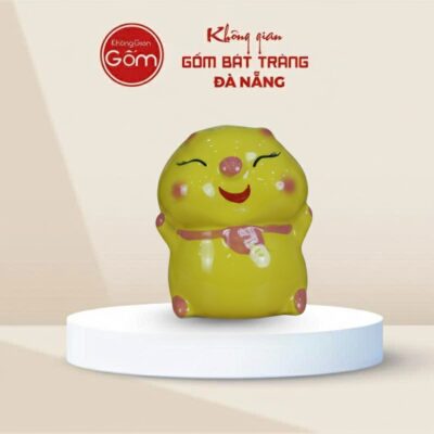 Heo Đất tiết kiệm Gốm Sứ bánh bao màu vàng - Ảnh đại diện