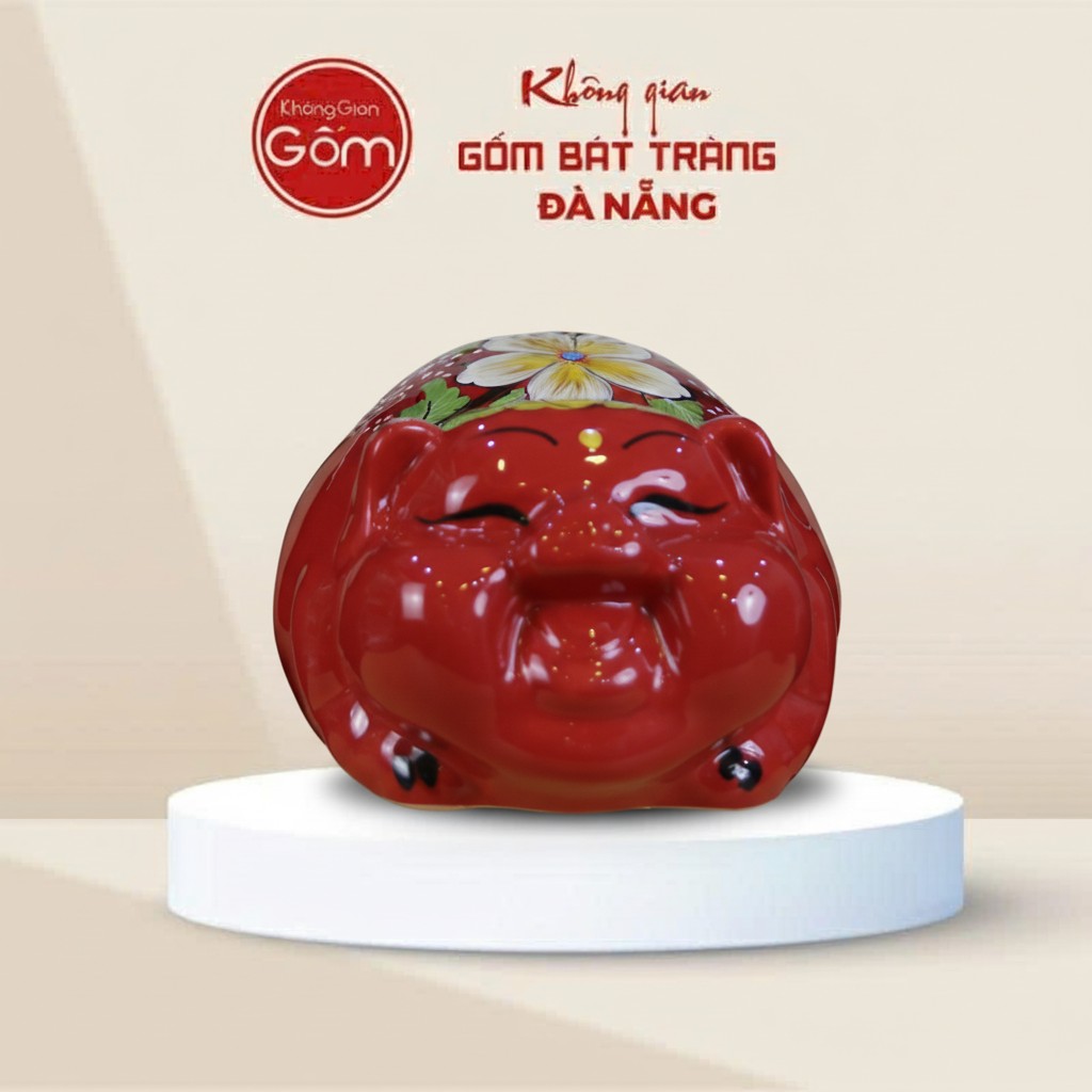 Lợn đất Bát Tràng mắt híp bụng phệ dáng nằm màu đỏ