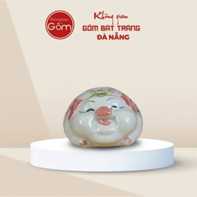 Lợn đất Bát Tràng mắt híp bụng phệ dáng nằm màu trắng mũi hồng - Ảnh đại diện