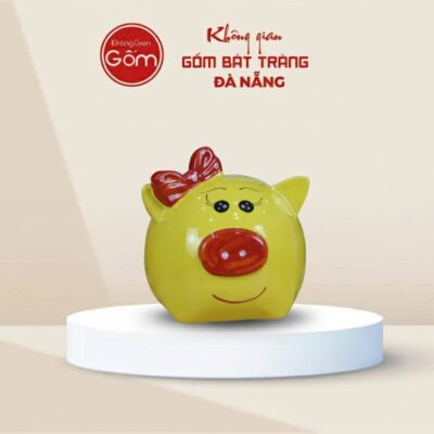 Lợn đất Bát Tràng thắt nơ màu vàng - Ảnh đại diện